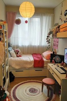 a bedroom with a bed, desk and shelves in the corner next to a window