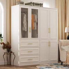 a large white armoire in a living room