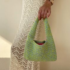 Crochet green small shoulder bag Trending now crochet bag a piece that will accompany you from special occasions to your daily life. The cute green bag provides both a youthful and dynamic look. Always carry the energy of spring and summer with you! The crochet tote bag has enough space for your daily items such as phone, headphones, wallet and makeup. It will always make a difference with its elegance and originality while accompanying you in your daily use or as a weekend bag. If you are looki T Shirt Yarn Bag, 18th Birthday Gifts For Girls, Crochet Green, Big Sister Gifts, Niece Gifts, Yarn Bag, 18th Birthday Gifts, Sac Week End, Women's Bags By Style