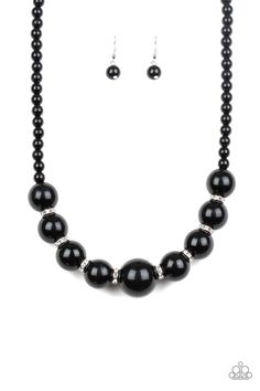 Threaded along an invisible wire, classic black beads give way to an alternating collection of oversized black beads and white rhinestone encrusted rings below the collar for a timeless sparkle. Features an adjustable clasp closure. Sold as one individual necklace. Includes one pair of matching earrings. Accessories Necklaces, Black Pearl Necklace, Thread Earrings, Necklace Sets, Women Necklace, Paparazzi Accessories, White Rhinestone, Black Necklace, Paparazzi Jewelry