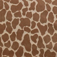 a brown and white animal print fabric