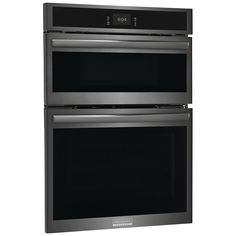 two ovens side by side on a white background