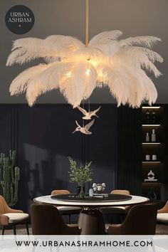 a chandelier hanging over a dining room table