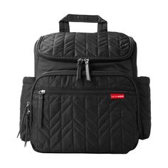 black quilted backpack with zippers on the front