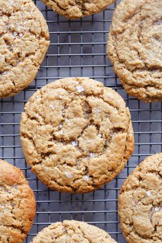 several cookies cooling on a wire rack with the words cream cheese keto cookies no sugar, no flour, low carb