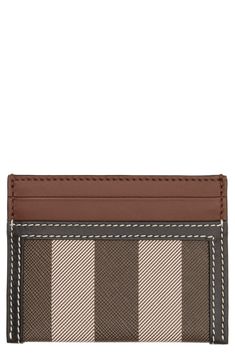 A blown-up check brings signature Burberry appeal to a compact card case designed with a center slip pocket and plenty of card slots. 3" height, 4" width Center slip pocket; four card slots Leather Made in Italy Designer Handbags Leather Card Case, Burberry Women, Small Leather Goods, Card Case, Designer Handbags, Card Slots, Slots, Burberry, Card Holder