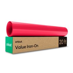 a red tube sitting on top of a cardboard box