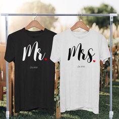 Mr. and Mrs. t-shirt set. These are perfect to wear after the wedding, and on the honeymoon! They also make the perfect wedding or bridal shower gift! HOW TO ORDER: Please note, this listing is for ONE t-shirt. If you want two shirts as shown in photo, please add each one to the cart separately! Thank you for shopping with us! If you have any questions or requests, please feel free to message us! Personalization is available!! Fit: These are a unisex fit making them larger than your typical wome Black Short Sleeve Shirt For Wedding, White Tops For Valentine's Day Anniversary, Mr And Mrs Shirts, Mr And Mrs Shirts Ideas, Mr And Mrs T Shirts Couple, Just Married T Shirts, Finally Honeymoon Shirts Matching, Married Couple Shirts Mrs. Bridal Shop, Married Shirt