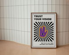 a sign on the wall that says trust your vision