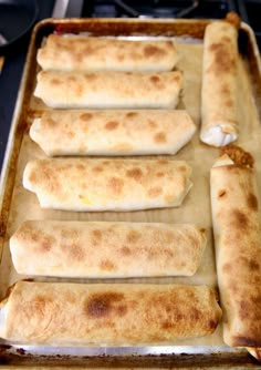 some food is laying out on a baking sheet and ready to be cooked in the oven