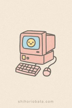 an old computer with a smiley face on it