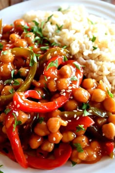 a white plate topped with beans and rice