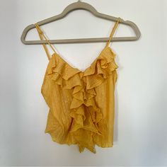 - Never Worn - Pretty Marigold Yellow Color - Has Open Detail In The Front (See Photo) Zara Yellow Beach Top, Yellow Sleeveless Top With Ruffles, Yellow Zara Top For Party, Zara Yellow Party Top, Yellow V-neck Ruffle Blouse, Yellow Ruffled Top For Beach, Zara Yellow Summer Top, Zara Mustard Top For Spring, Yellow Zara Tops For Day Out