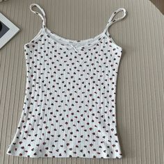 48730127106216 Cute Spring Tops With Tank Straps, Cute Tank Top For Spring, Cute Tank Strap Tops For Spring, Casual Printed Summer Vest, Casual Printed Spring Vest, Cute Summer Tops With Tank Straps, Cute White Tank Camisole, Cute Summer Sleeveless Tank Top, Red Strawberry Print Top For Summer