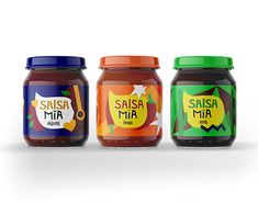 three jars of salsa sit next to each other on a white surface and one jar has a label that says salsa mia