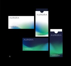 three business cards with the word aurora on them