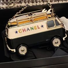 a black and white van purse with the word chanel on it