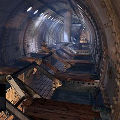 the inside of a tunnel with lots of steel bars