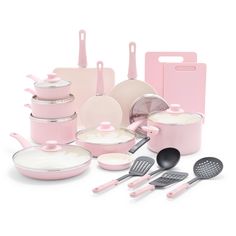 a pink kitchen set with pots, pans and utensils next to each other