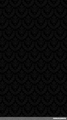 black and white wallpaper with an ornate design in the middle, it is dark