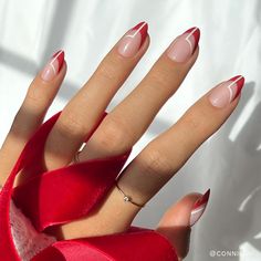 Elevate your look with the Red Martini Nail Set! This adorable style features holiday-red french tips with a trending-right-now geometric design for some extra oomph. Plus, our most popular short-almond shape offers a natural, wearable style that works well with all your day-to-night looks. Kit Includes:  30 nails in 1 Red And White Nails Almond Shape, Round Mail French Tip, Almond Triangle French Tip Nails, Neutral Nails With Red Design, Cool French Nail Designs, Almond Stilleto Nails Designs, Red Minimalist Nail Art, Nails 2023 Trends Red And Black, Red Nail Art Almond Shape