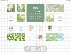 a desktop calendar with many different images on the screen, including flowers and plants in green