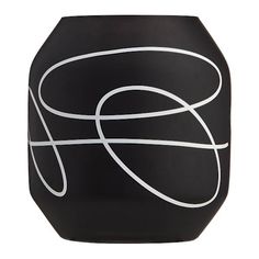 a black vase with white lines on it