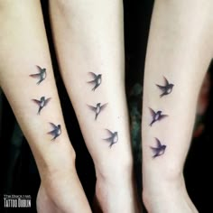 three small birds on both wrist tattoos