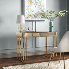 a living room scene with focus on the console table and chair, which is decorated in gold