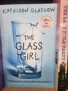 the glass girl by kate kalleen glasgow is on display in a bookstore