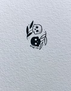 a skull with leaves on its head and the word gang me written in black ink