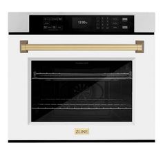 a white and black oven with gold trim