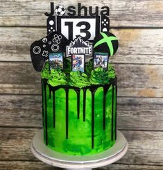 a cake with green icing and photos on top that reads joshua 13 fortie