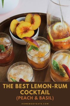 the best lemon - rum cocktail peach and basil is served in glasses on a tray