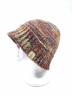 Colors: Acorn Brown Knitted Hat One Size Fits Most, Casual Brown Knitted Hat, Adjustable Brown Beanie For Fall, Brimmed Brown Crochet Hat For Fall, Adjustable Cozy Brown Hat, Brown Beanie Cap For Fall, Brown Crochet Hat With Curved Brim For Fall, Casual Brown Crochet Hat For Outdoor, Multicolor Brimmed Hats For Fall