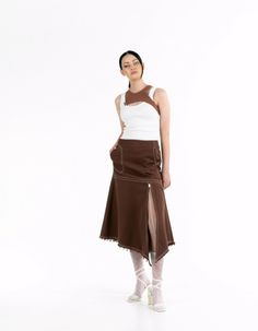 This midi skirt features a low rise and is made of lightweight denim that flares out at the bottom. It has a back zipper and button closure, and the pockets add convenience.Product measurements:Size XS: waist 72 cm / 28,4 in, hips 95 cm / 37,4 inSize S: waist 76 cm / 30 in, hips 99 cm / 39 inSize M: waist 80 cm / 31,5 in, hips 104 cm / 41 inSize ML: waist 84 cm / 33 in, hips 109 cm / 43 inLength from waist to bottom front: 89 cm / 35 inSide length: 78 cm / 30,7 inModel: height 178 cm / 70 in; bust: 88 cm / 34,7 in; waist: 63 cm / 24,8 in; hips: 93 cm / 36,6 in; wearing size: SSeason: Spring/Summer/AutumnComposition: 100% cottonCare instructions:Machine wash at 30°C. Spin at 600-800 rpm.Do not tumble dry.Do not use chlorine bleach or stain removers.Iron at high temperature.It is recommended Brown Denim Skirt, Stain Removers, Brown Denim, Fast Fashion, High Temperature, Fabric Color, Denim Skirt, Fashion Models, Low Rise