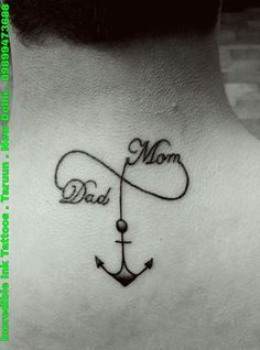 a woman's neck with an anchor and the word mom on it