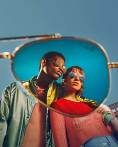 Man and woman wearing mirrored lens Ray-Ban sunglasses. This image was included in the article: 24 Luxury Eyewear Brands Making The Highest Quality Glasses, on MensFlair.com Eyewear Ad, Ray Ban Eyewear, Reflective Sunglasses, Polarized Aviator Sunglasses, High Fashion Accessories