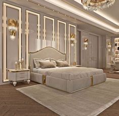 a bedroom with a large bed and chandelier