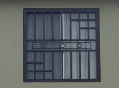 a window that has bars on the side of it