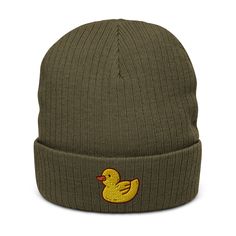 Yellow Duck Embroidered Ribbed Knit Beanie, Kawaii Baby Ducky, Adult Winter Hat, Toy Rubber Duck Hat, Cute Gift For Duck And Nature Lovers. You can't go wrong with the ribbed knit beanie! It's stylish, warm, and fitting for most clothing styles and head sizes. * 50% recycled polyester and 50% acrylic * Double layer knit * Cuffed beanie * 8.27″ (21 cm) in length * Blank product sourced from China Cute Knitted Cap Beanie, Knitted Cotton Cap, Playful Cotton Beanie, Novelty Green Beanie Hat, Novelty One Size Fits Most Cap Beanie, Novelty Cap Beanie One Size Fits Most, Playful Cotton Winter Hat, Novelty One-size-fits-most Beanie Cap, Fun Cotton Beanie Hat