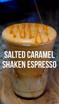 salted caramel shaken espresso in a glass on a wooden coaster