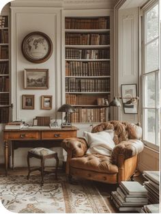 a living room filled with furniture and lots of books