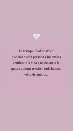 a pink background with a white heart on the top and words in spanish above it