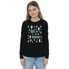 This Let It Snow Snoballs Youth Long Sleeve Shirt is made of 100% airlume combed and ringspun cotton, which is known for its softness and durability. The shirt has a regular fit, classic crew neck, and ribbed cuff. What better way to enjoy the cool weather than with colorful snowflakes and snoballs. The let it snow quote is a fun play on words where one can imagine snoballs falling from the sky like snowflakes. This shirt is perfect for a winter birthday party, holiday party at school, sports, dance, gymnastics, music lessons, playground, school fairs, winter festivals, concerts, decorating the tree, looking at Christmas lights, watching cozy Christmas movies and more. The fabric is very comfortable, breathable and stretchy, which makes it easy to move and play. It is a festive kids shirt Let It Snow Kids Shirt, Snow Quotes, New Orleans Christmas, Southern Winter, Winter Festival, Falling From The Sky, Winter Birthday, Word Play, Good Times Roll