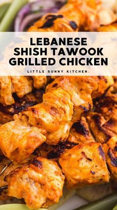 chicken skewers on a plate with text overlay that reads japanese shish tawok grilled chicken