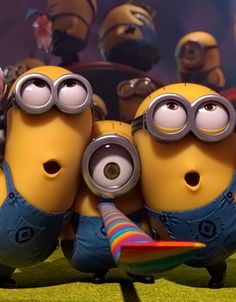 three minion characters with captioning in spanish