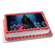 a star wars scene is on the side of this birthday cake with red icing