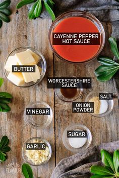 ingredients to make cayenne pepper hot sauce in small bowls on a wooden table