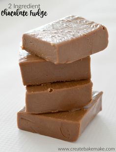 three pieces of chocolate fudge stacked on top of each other